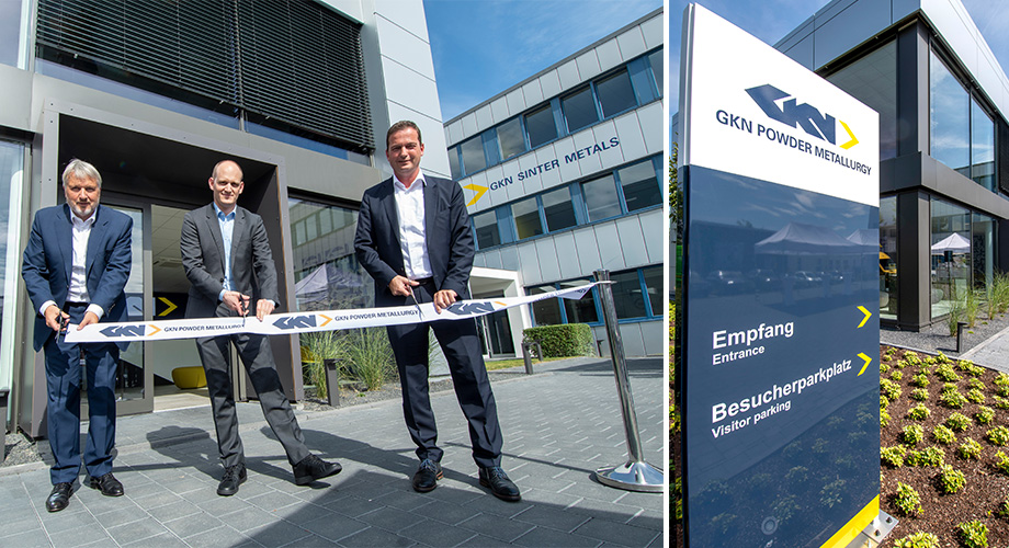 Customer Centre Bonn Opening. Three men cutting a GKN ribbon outside new GKN building