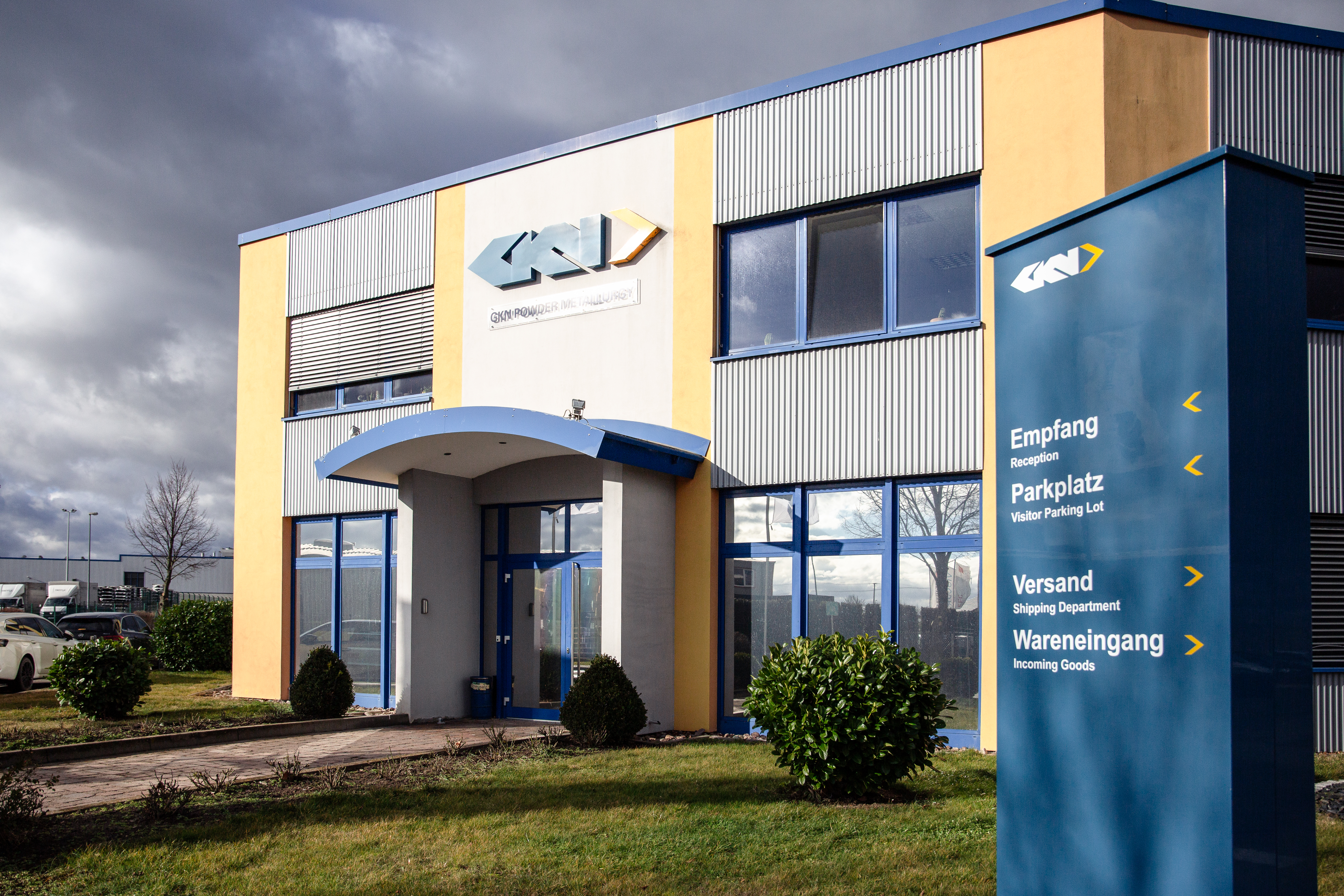 gkn logo on the side of a sunny building (1)